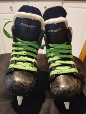 A Pair Of Bauer Supreme 140 With Green Laces. Size 13R