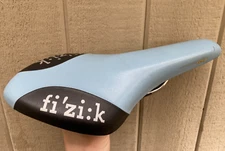 Fi'z:ik Arione Tri 2 Saddle Carbon Reinforced Baby Blue/Black Made In Italy