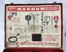 Milwaukee 1/2" right angle Holeshooter drill, with drill bits. As you could see