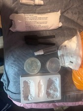 model plaster roll and bag of plaster + mould and tools