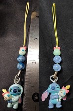 2 Disney Stitch Phone Charm Figures with Scrump while in PJs and Holding Scrump