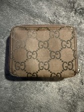 Gucci GG Pattern Zip-Around Wallet