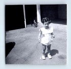 Old Vintage Photo SOLO GIRL STANDING OUTSIDE HOUSE ANTIQUE FOUND SNAPSHOT