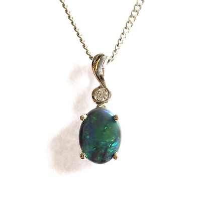 Australian natural solid black opal pendant set in sterling