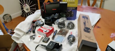 Canon EOS 4000D 18MP Digital SLR Camera New with Voking Flash and lots of extras