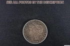 NobleSpirit (JL) 1886 S Morgan Silver Dollar Fine / Very Fine Dark Toning