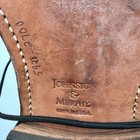 Brown leather Johnston & Murphy Optima Burgundy size 11 with black laces, stitched in place, on a dark background.