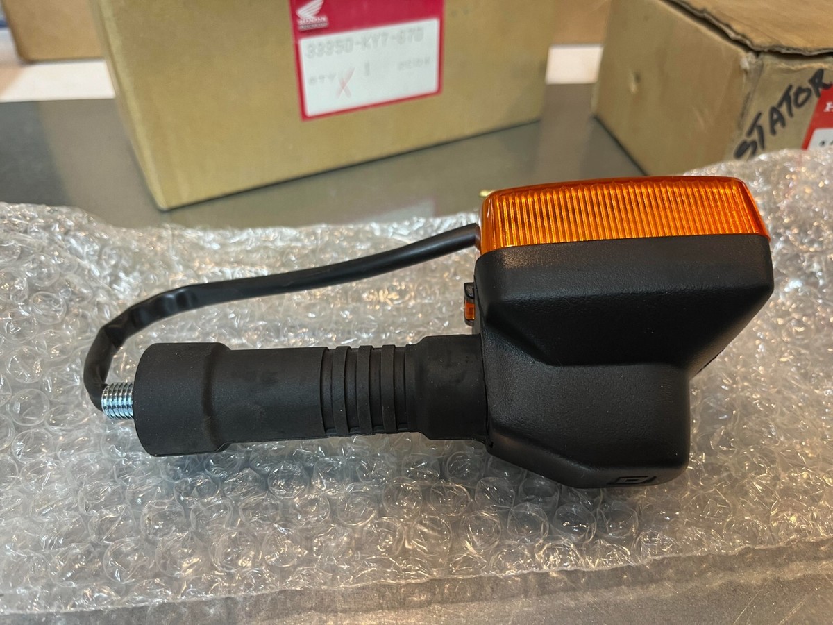 NOS OEM HONDA NX125 LEFT TURN SIGNAL SET '88-'90 33350-KY7-670 | eBay