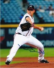 MANNY BANUELOS   ATLANTA BRAVES  ACTION SIGNED 8x10
