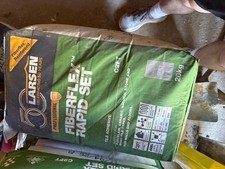 Building supplies not used 21 bags of fiberflex/adhesive and pallet of bricks