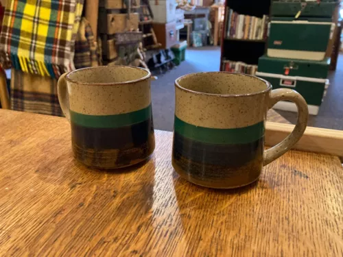 Two (2) stoneware coffee cups tea mugs brown blue green pottery handmade crafted