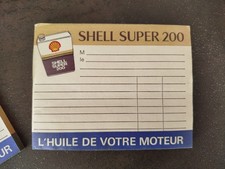 Deux anciens bloc notes / factures pour garage "SHELL Super 200".