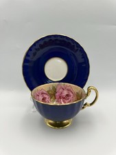 Aynsley Pink Large Cabbage Roses Tecup And Saucer Floral In Cobalt Blue Colour.