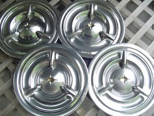 1957 57 OLDSMOBILE CUSTOM CRUISER JETSTAR STARFIRE ROCKET HOLIDAY FIESTA HUBCAPS