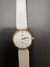 OLEVS Woman’s 5869 watch 6.5 Minimalist Case White Leather Band W/Date Display