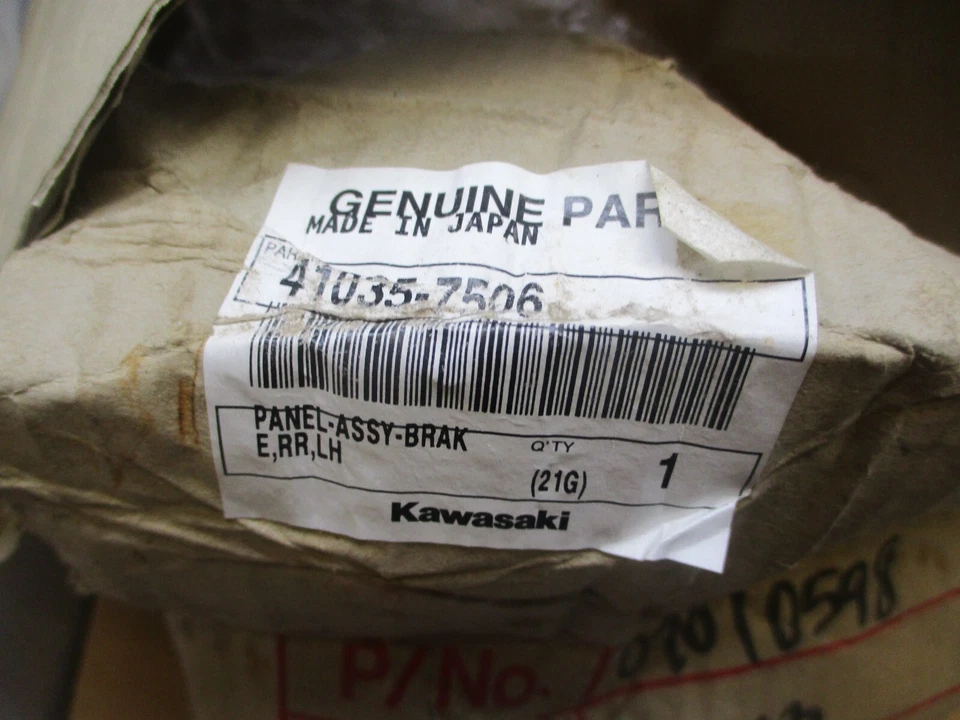 Conjunto de panel-freno trasero izquierdo Kawasaki genuino 41035-7506 Foto 2 de 4