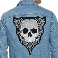 Skull in tribal pattern back patch. Embroidered patch.