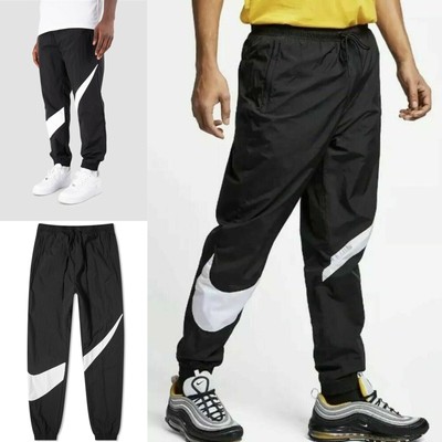 nike big swoosh woven pants