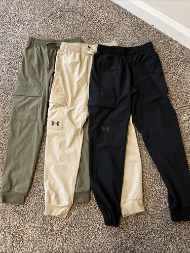 Under Armour boys Performance Pants Size Youth Medium (lot of three)