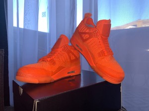 orange flyknit jordan 4