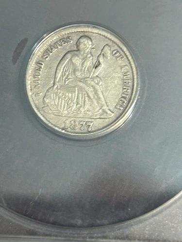 1877 CC seated liberty dime graded xf 45. Details: scratched and cleaned.
