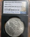 1884-O BU Morgan Dollar w/ Original Bag Fragment NGC Brilliant Uncirculated