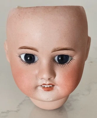 Tête de poupée ancienne en porcelaine SFBJ 60 Paris. Jamais montée - Photo 1/4