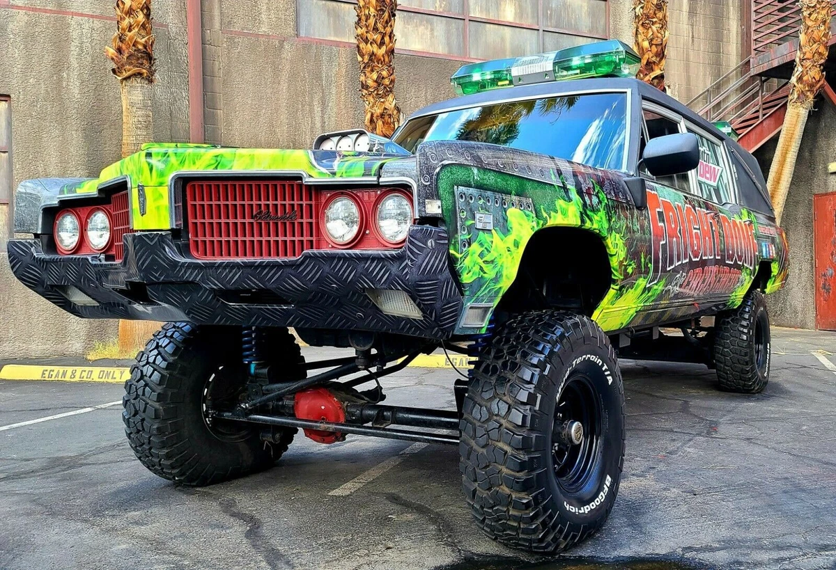 1969 Oldsmobile Hearse with colorful custom paint job