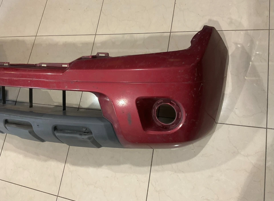 Cubierta de parachoques delantero roja Nissan Frontier 62022+zl00b 2009-2021 OEM Foto 2 de 4
