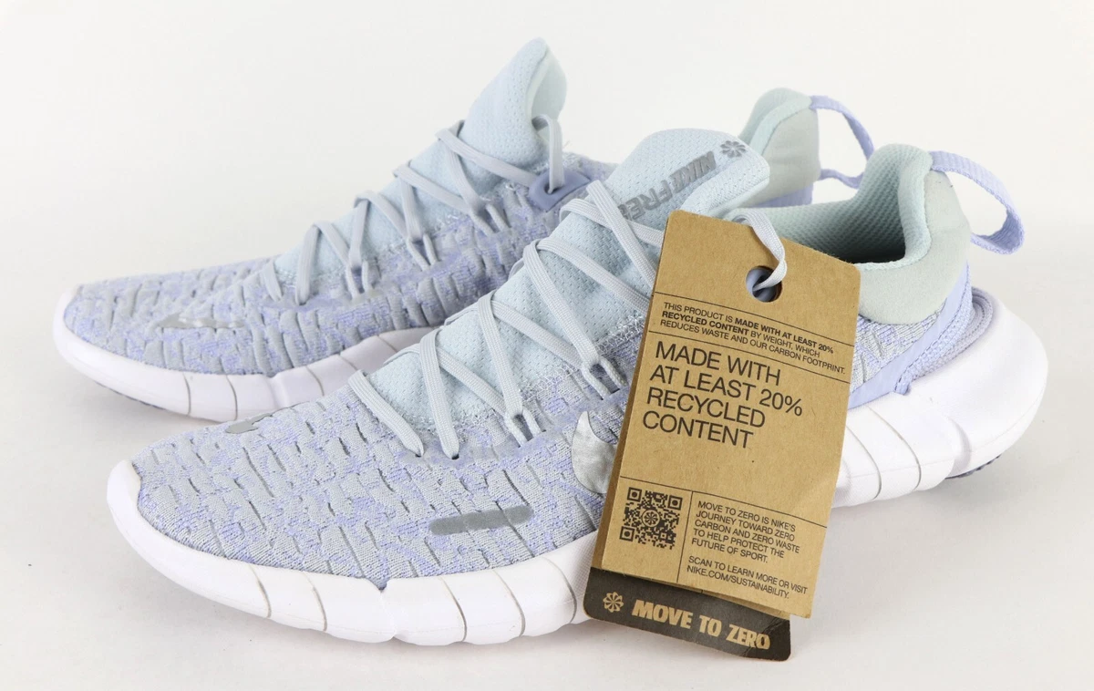 Nike Women s Free Run 5.0 Running Shoes Pure Platinum Metallic