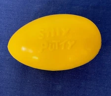 Vintage Silly Putty Egg. Yellow. Empty