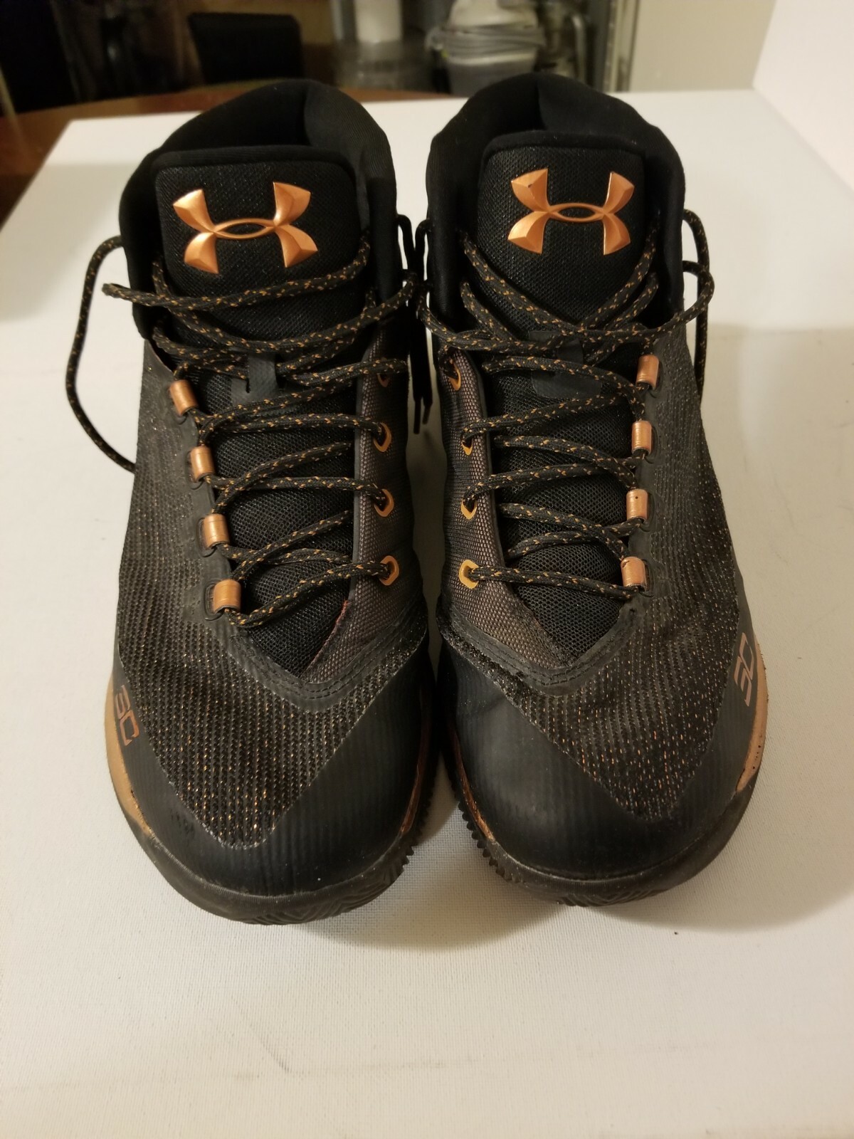 steph curry gold and black shoes