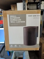 1-Light Modern Black LED Solar Outdoor Wall Cylinder Light with Dark Sky