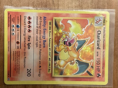 charizard 150 hp pokemon card Graded: 11/108 Evolutions Staff Promo (2016) Beckett Double Infinity Gaming art depiction of Charizard that makes it a true standout piece 2016 Pokemon Xy Evolutions 12
