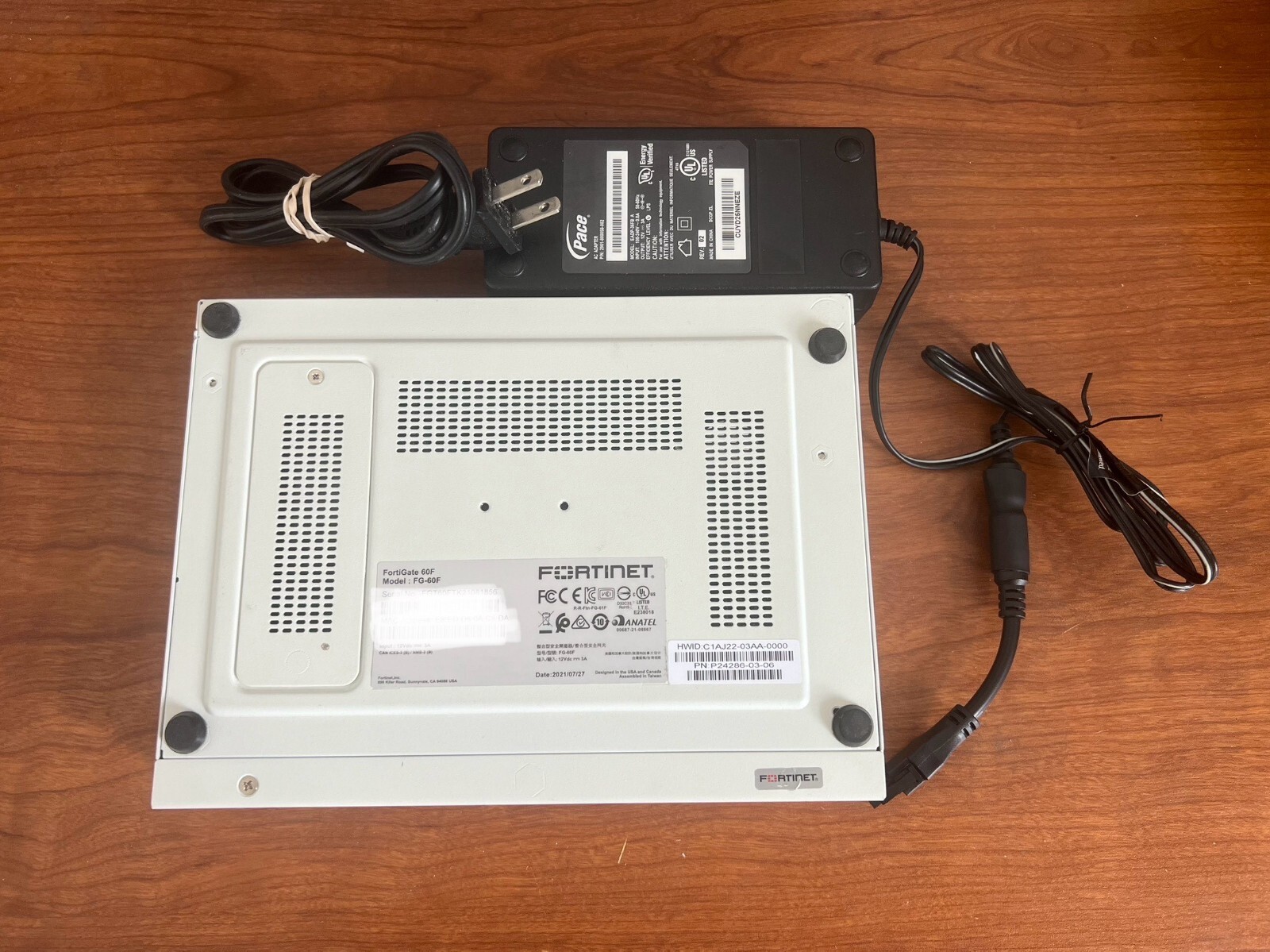 как выглядит Fortinet FortiGate FG-60F Firewall with Power Adapter - used-registered-claimed фото