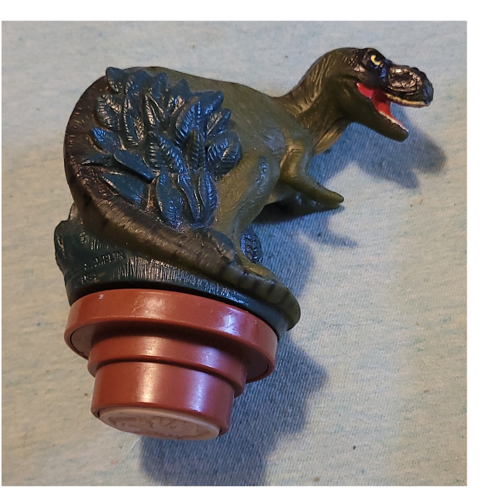 Dinosaur Skull Design Plastic Bottle Stopper Collectible Gre