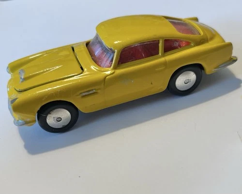 Vintage Yellow ASTON MARTIN DB4  Corgi toys 218  Made in Great Britain 1960