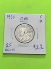1934 Canadian .8  Silver Quarter. King George V.  F12.  TRENDING AT $22