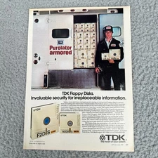 TDK Floppy Disks Purolator Armored Truck Retro Computer Storage Print Ad 1983