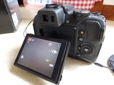 Fujifilm FinePix SL1000 16MP - Negro, batería, tarjeta SD y estuche