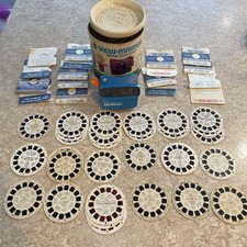 View Master Set W/Vintage Charlie brown Tin  View Master 3D  31 Reels