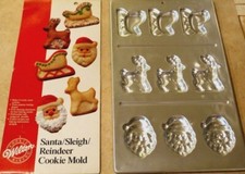NEW WILTON SANTA/REINDEER/SLEIGH COOKIE TREAT PAN, 9 CAVITY, 2306-111