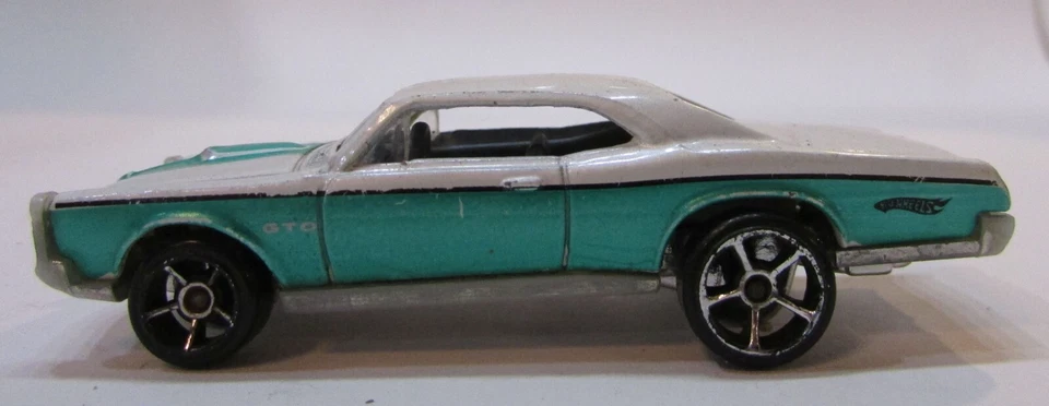 Pontiac GTO 1967 1996 Hot Wheels más rápido que nunca 1967 coche de juguete fundido a presión 1:64 Foto 3 de 4