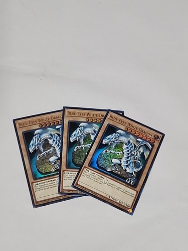 YUGIOH BLUE-EYES WHITE DRAGON LC01-EN004 ULTRA X3 Playset NM - 第 1/2 張圖片