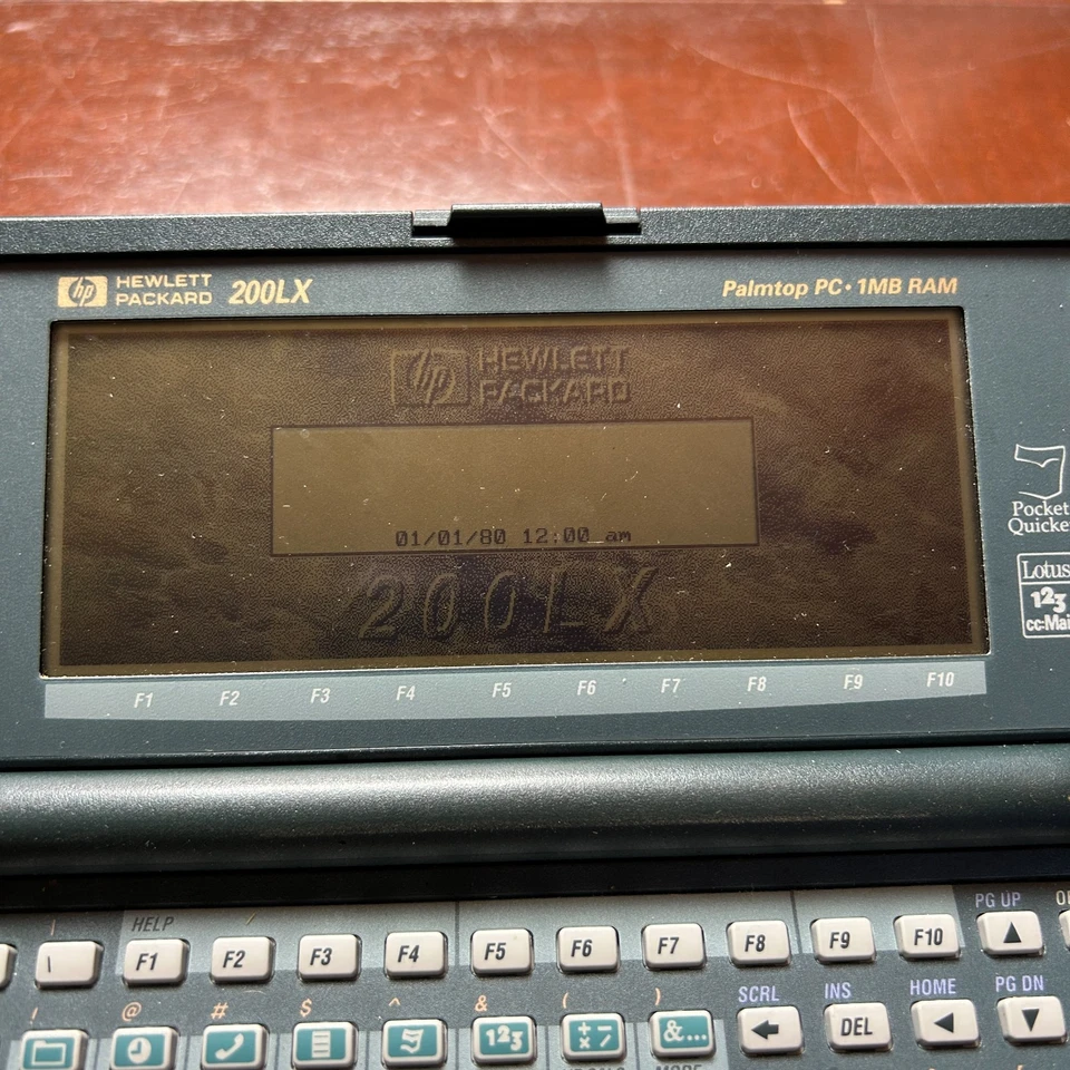 De colección Hewlett Packard HP 200LX Palmtop PC 1MB RAM Estuche De Colección Probado Funcionando Foto 4 de 4