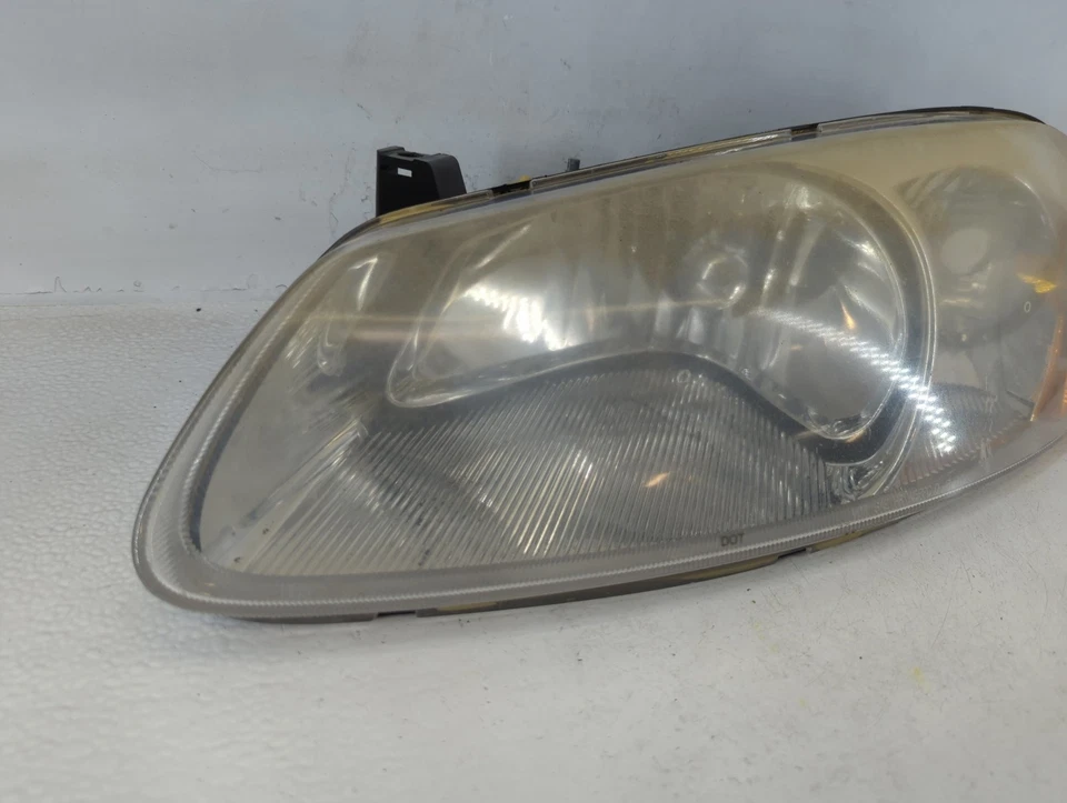Chrysler Sebring 2001-2002 conductor izquierdo OEM faro lámpara XOG6Y Foto 2 de 4