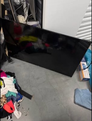 58 inch smart tv 4k Roku in black with wall mount