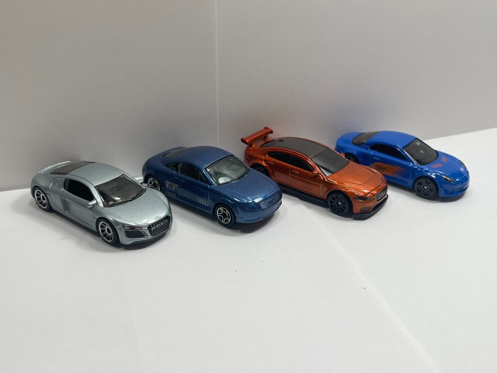 1/64 Hot Wheels Lot of 4 Exotic Cars (Audi TT Coupe, Audi R8, Jaguar XE, Alpine)