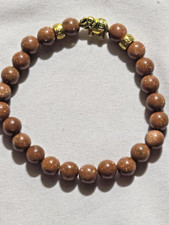 Natural goldstone charm gold tone Elephant bracelet 7.5"