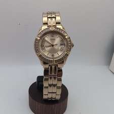 Guess Women's UB5110L1 Waterpro Analog/Date Watch. Gold Tone w Crystal, Works.